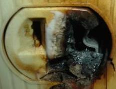 severely Burnt electrical outlet