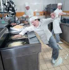 cook slip on floor and hand into fryer