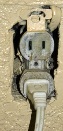 Old worn electrical outlet